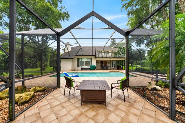 7100 E Cypresshead Drive E, Parkland, FL 33067