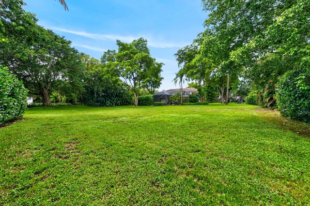 7100 E Cypresshead Drive E, Parkland, FL 33067