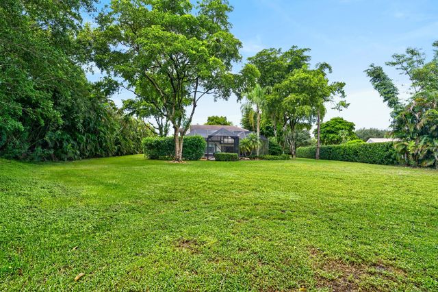 7100 E Cypresshead Drive E, Parkland, FL 33067