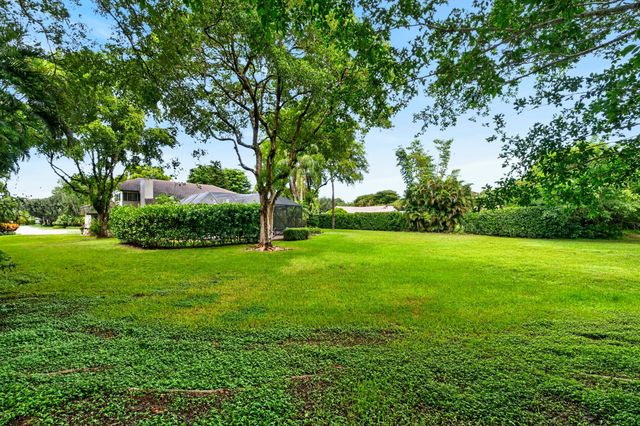 7100 E Cypresshead Drive E, Parkland, FL 33067