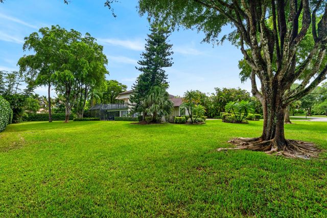 7100 E Cypresshead Drive E, Parkland, FL 33067