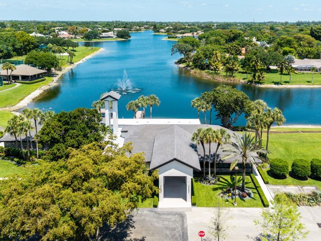 7100 E Cypresshead Drive E, Parkland, FL 33067