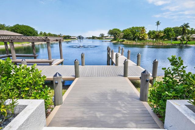 7100 E Cypresshead Drive E, Parkland, FL 33067