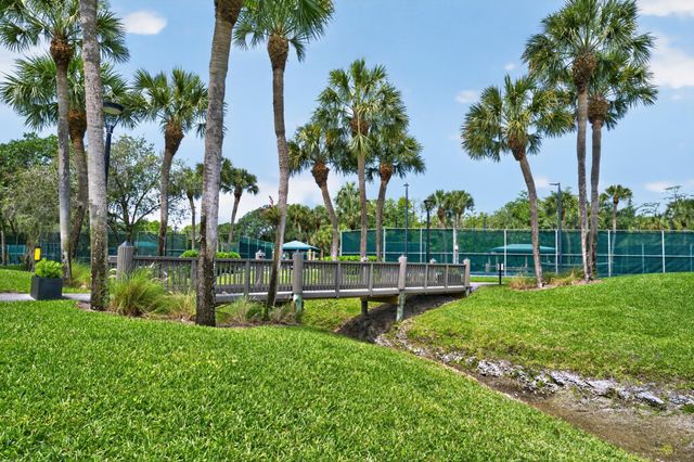 7100 E Cypresshead Drive E, Parkland, FL 33067