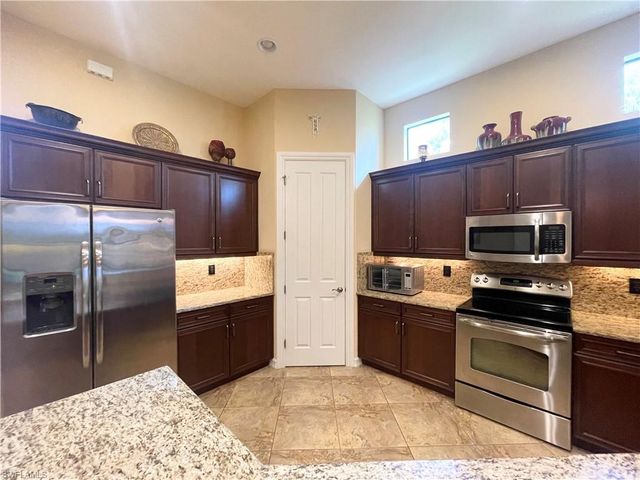 7302 Acorn WAY, Naples, FL 34119