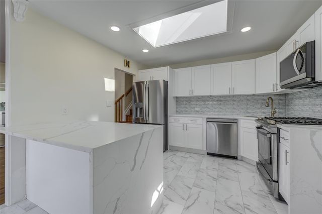 8 Sintsink Drive W, Port Washington, NY 11050