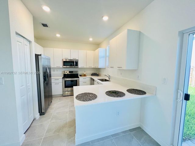 12612 NW 23rd Pl, Miami, FL 33167