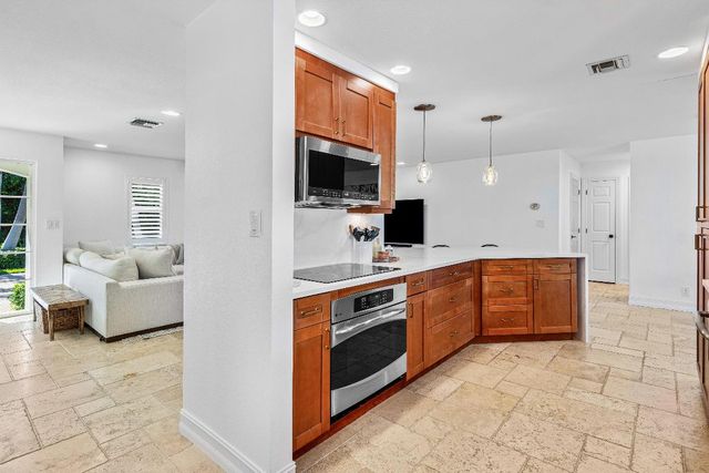 150 Periwinkle Drive, Hypoluxo, FL 33462