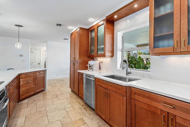 150 Periwinkle Drive, Hypoluxo, FL 33462