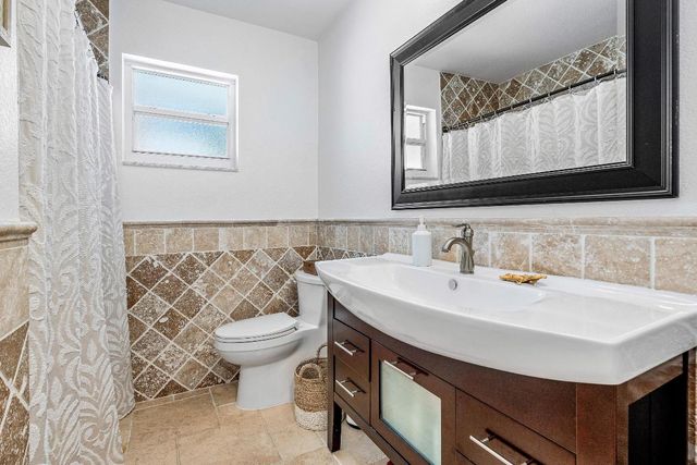 150 Periwinkle Drive, Hypoluxo, FL 33462