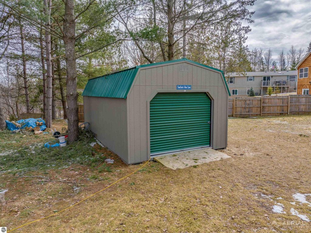 Image 43 of property listing at 830 Richland Avenue, Lupton, MI 48635