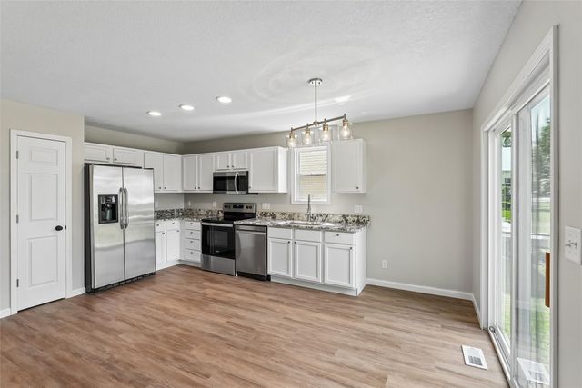 6540 SE Sundancer Swing, Pleasant Hill, IA 50327