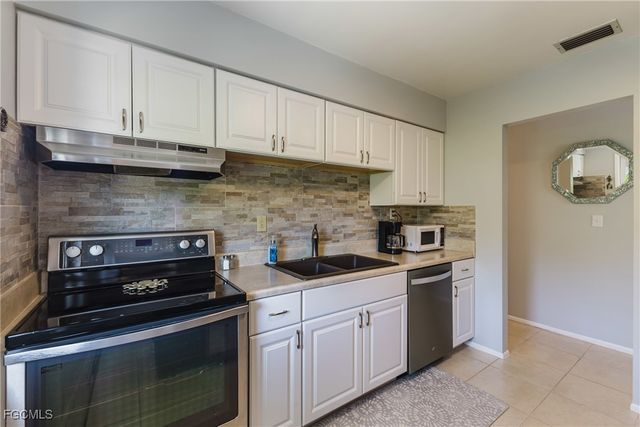 36 Temple CT, Lehigh Acres, FL 33936