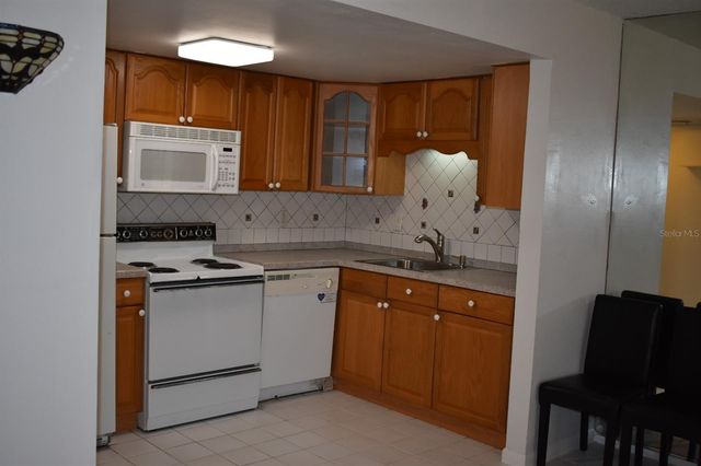 7701 STARKEY ROAD 313, Seminole, FL 33777