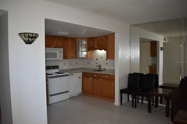 7701 STARKEY ROAD 313, Seminole, FL 33777