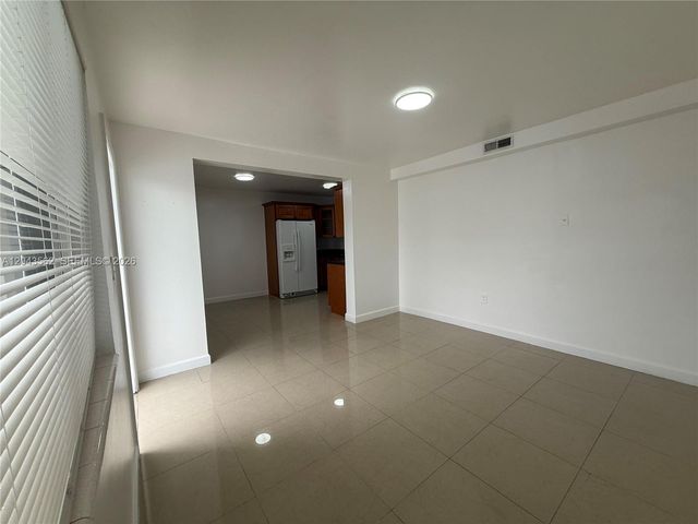 1122 NW 32nd Court front, Miami, FL 33125