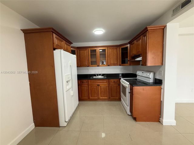 1122 NW 32nd Court front, Miami, FL 33125