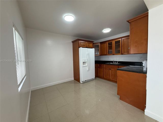 1122 NW 32nd Court front, Miami, FL 33125
