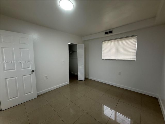 1122 NW 32nd Court front, Miami, FL 33125