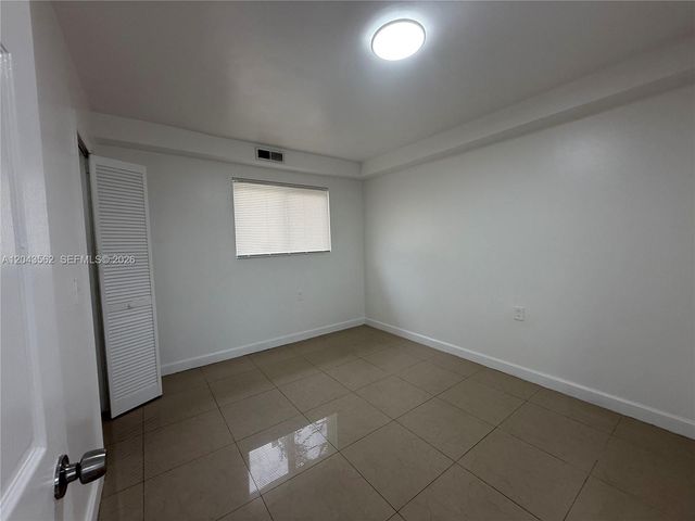 1122 NW 32nd Court front, Miami, FL 33125