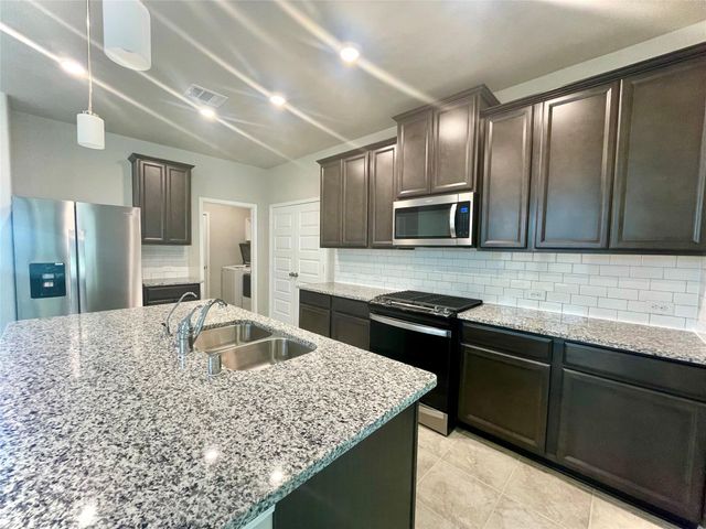 17526 Rosette Grass Drive, Conroe, TX 77385