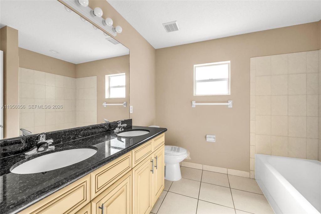 Image 13 of property listing at 1001 SW 15th St, Deerfield Beach, FL 33441