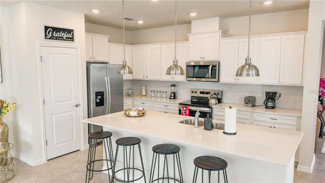 16129 PALM FROND AVENUE, Clermont, FL 34714