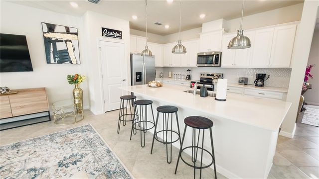 16129 PALM FROND AVENUE, Clermont, FL 34714