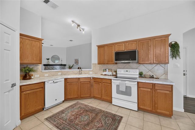 9213 Grant Forest DR, Austin, TX 78744