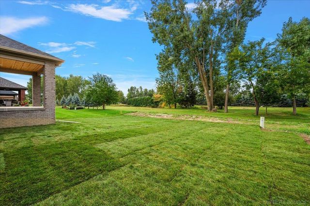 16468 Via Villagio Street, Macomb, MI 48042