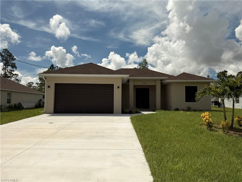 469 Woodman DR, LEHIGH ACRES, FL 33972 — exterior