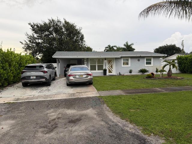 3407 TACONIC Drive, West Palm Beach, FL 33406