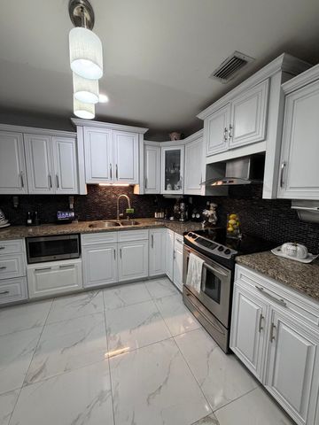 3407 TACONIC Drive, West Palm Beach, FL 33406