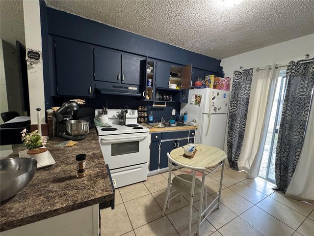 201 E BUCHANON AVENUE, Orlando, FL 32809