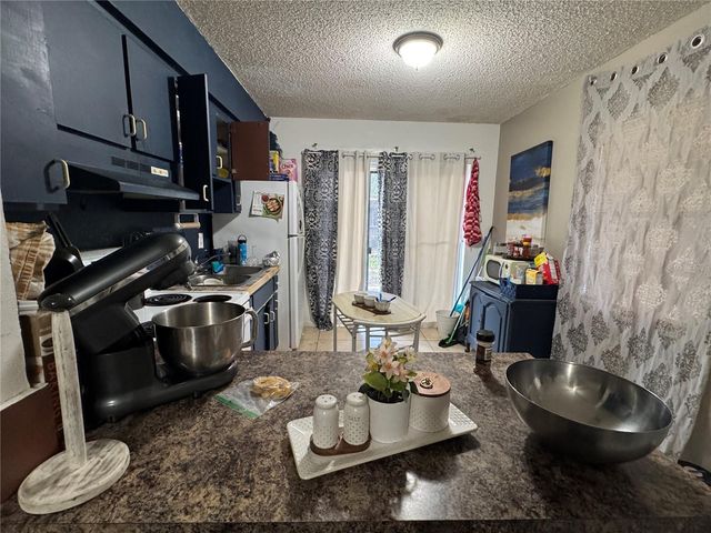 201 E BUCHANON AVENUE, Orlando, FL 32809