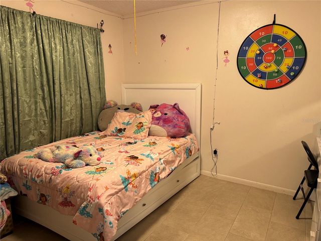 201 E BUCHANON AVENUE, Orlando, FL 32809