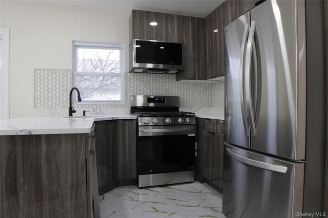 22011 94th Drive, Queens Village, NY 11428