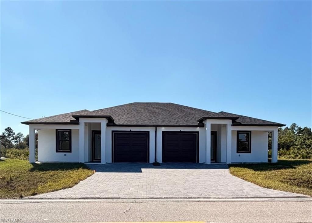 213-215 W 12th ST, LEHIGH ACRES, FL 33972 — exterior