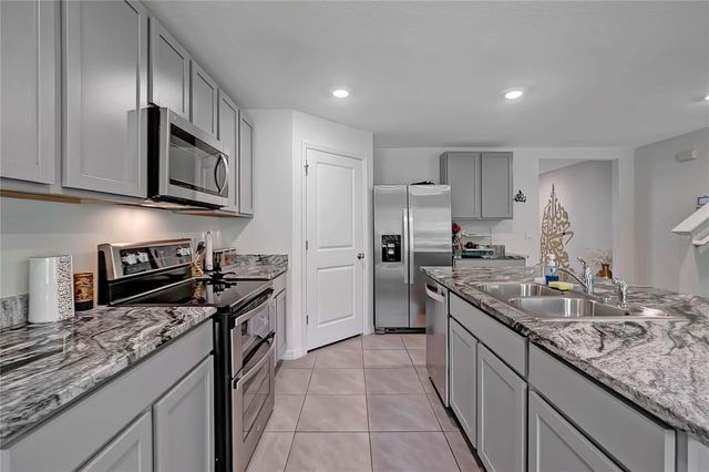 7737 ROSEWOOD GARDEN LOOP, Tampa, FL 33637