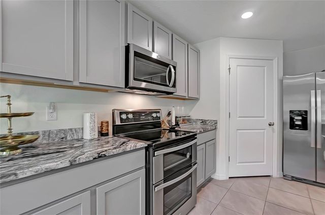 7737 ROSEWOOD GARDEN LOOP, Tampa, FL 33637