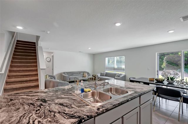 7737 ROSEWOOD GARDEN LOOP, Tampa, FL 33637