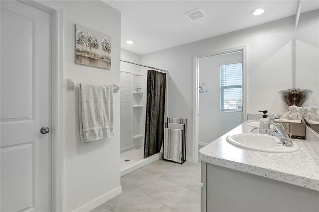 7737 ROSEWOOD GARDEN LOOP, Tampa, FL 33637