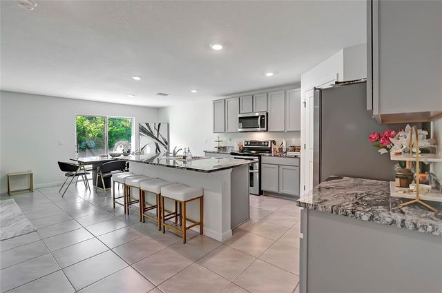 7737 ROSEWOOD GARDEN LOOP, Tampa, FL 33637