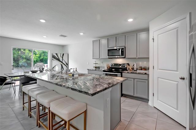 7737 ROSEWOOD GARDEN LOOP, Tampa, FL 33637