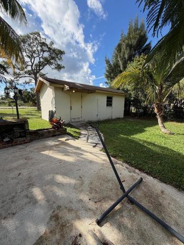 813 Burch Drive, West Palm Beach, FL 33415