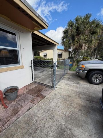 813 Burch Drive, West Palm Beach, FL 33415