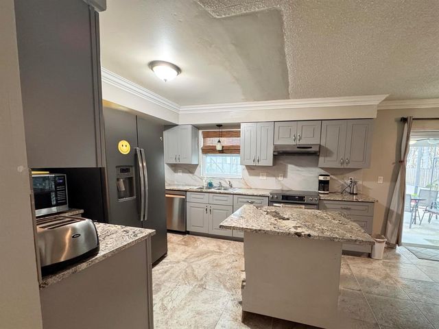 443 SE Langfield Avenue, Port St. Lucie, FL 34984