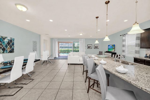 8887 MENTON LOOP, Kissimmee, FL 34747