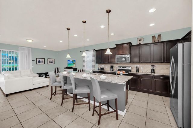 8887 MENTON LOOP, Kissimmee, FL 34747