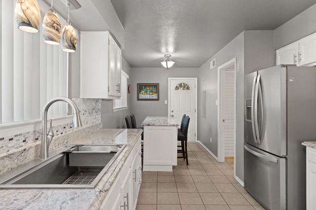 1212 Michael Hughes Drive NE, Albuquerque, NM 87112